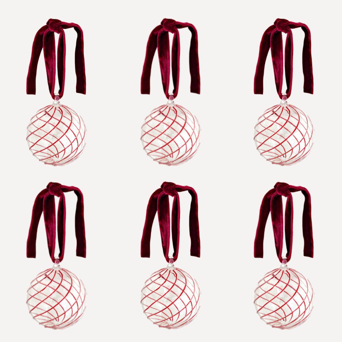 Issy Granger Red Glass Swirl Christmsa Baubles. Glass Christmas Ornaments. Christmas Tree Decorations. Box of six Christmas ornaments.