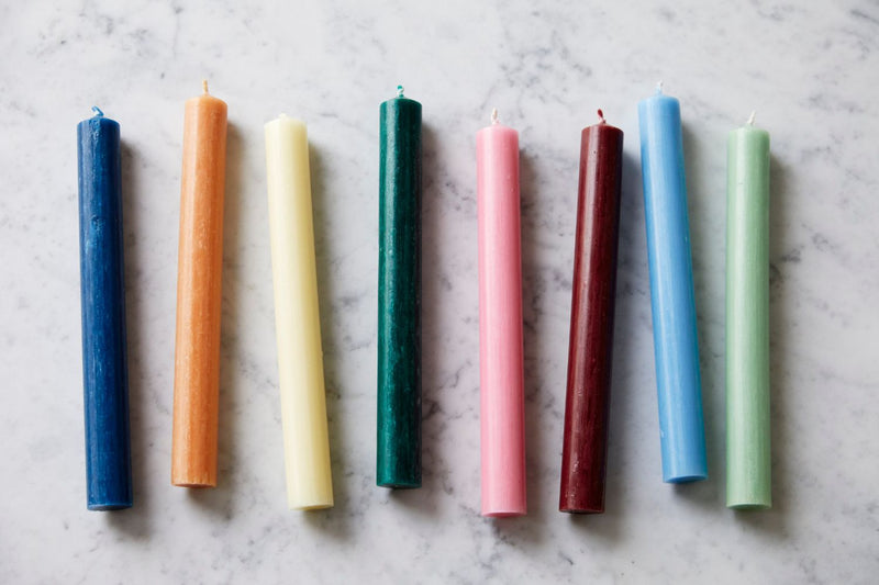 Colourful wax dinner candles 