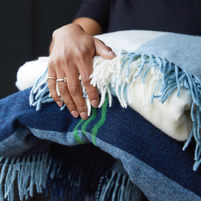 Issy Granger Merino Lambswool Blankets. Wool blankets. Wool throws. Soft Throw. Woolen throw. Cosy blankets. Striped blanket. Stripey blanket. Blue Striped blanket