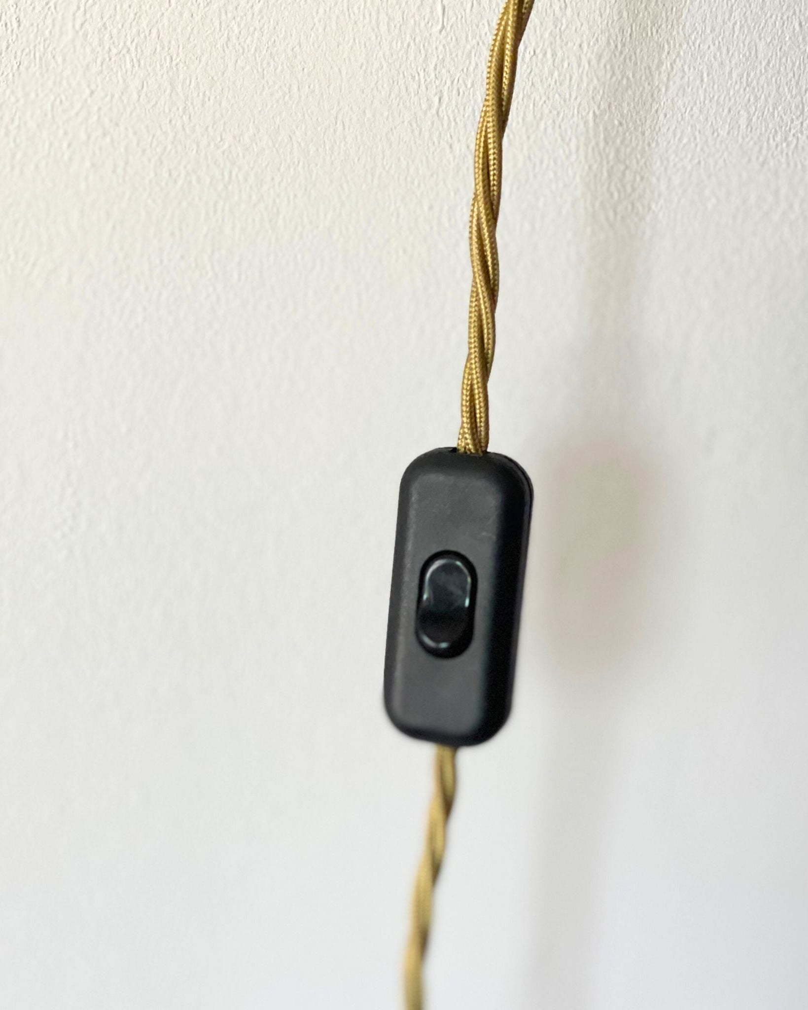 Gold flex cord and black switch
