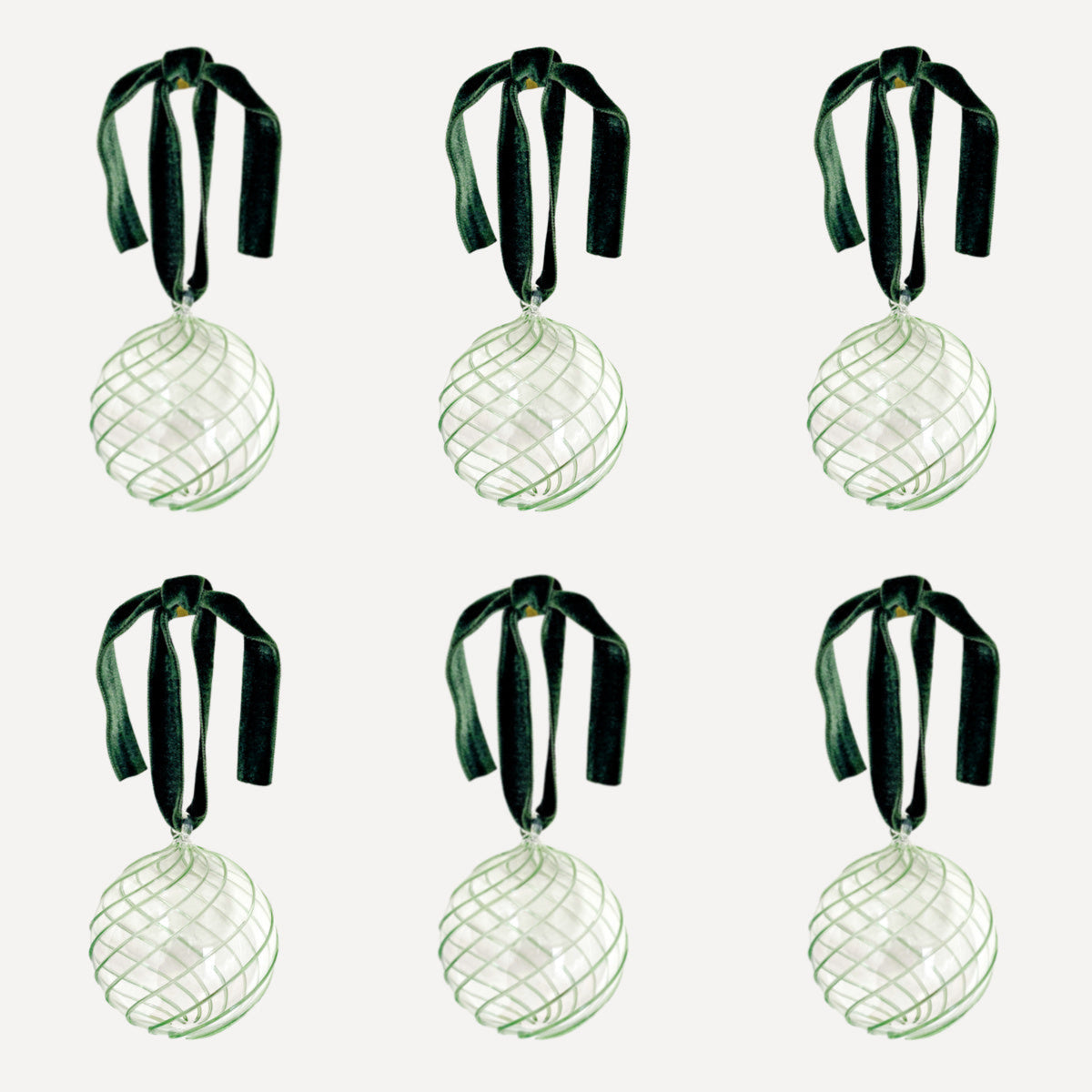 Issy Granger Green Swirl Glass Christmas Baubles. Glass Christmas Ornaments. Glass Christmas Tree decorations. Velvet Ribbon. Set of six decorations.