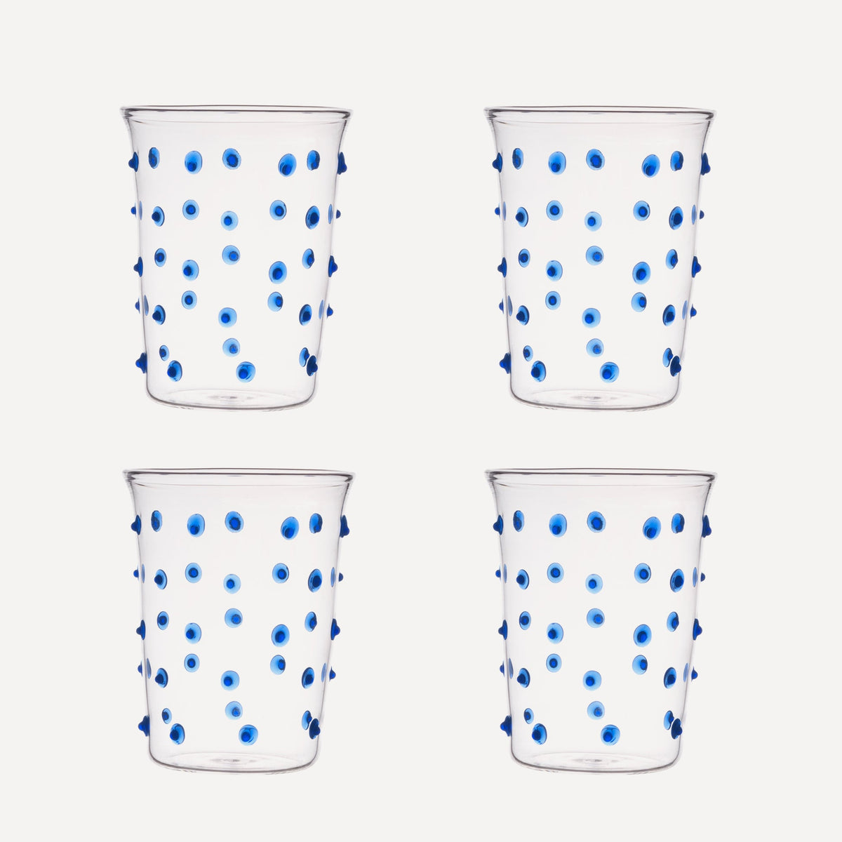 Issy Granger Glass. Set of 4 Glass tumbler. Spotty Blue Glass. Blue Pom Glass. Blue Dotty Water Glass. Set of four