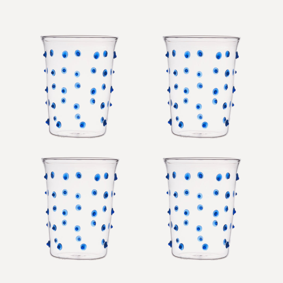 Issy Granger Glass. Set of 4 Glass tumbler. Spotty Blue Glass. Blue Pom Glass. Blue Dotty Water Glass. Set of four