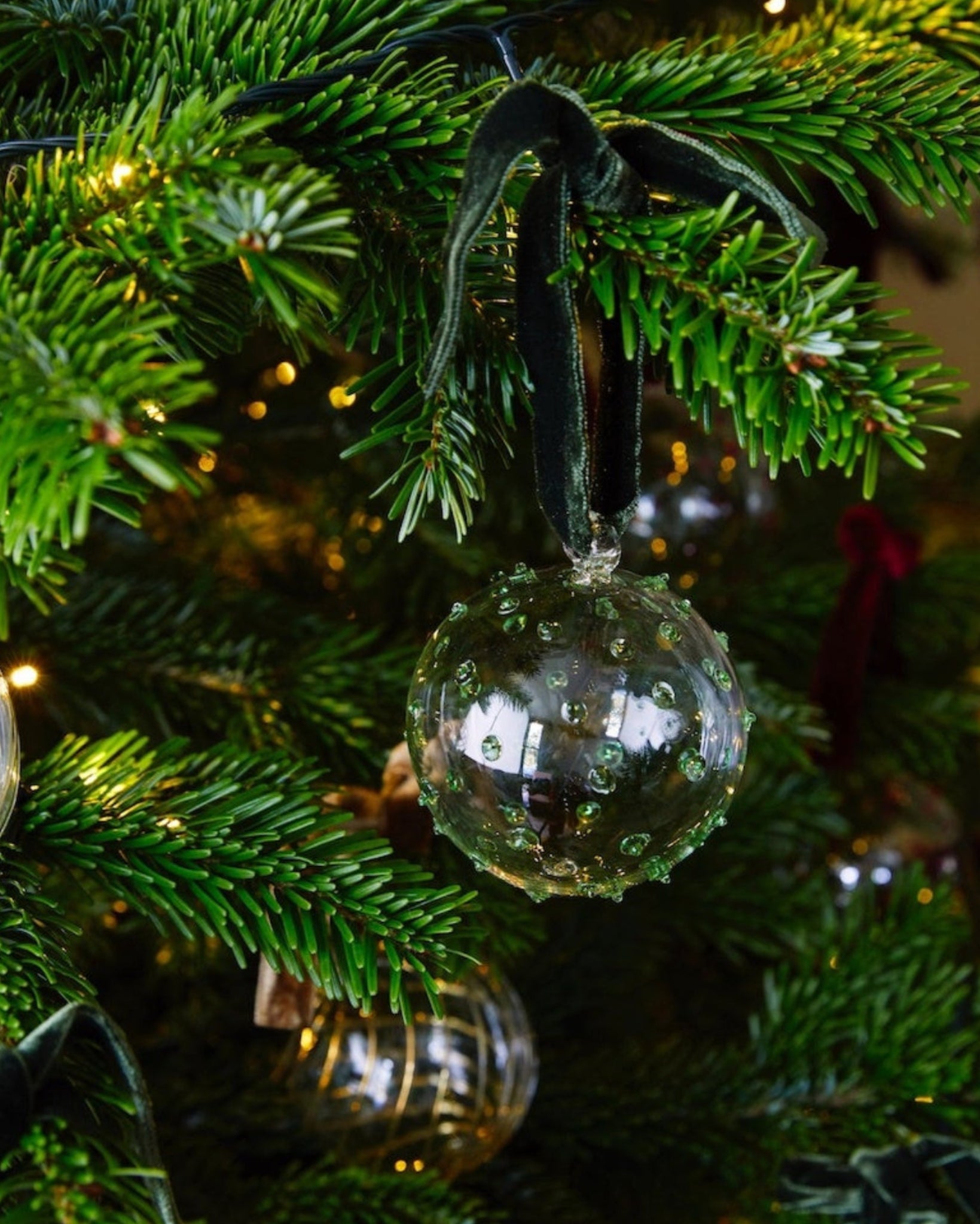 Issy Granger Glass Christmas Bauble. Christmas tree decoration. Glass Christmas Ornament. Green dotty christmas bauble. Spotty Green Christmas Tree decoration.