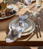 Issy Granger White and blue linen napkin