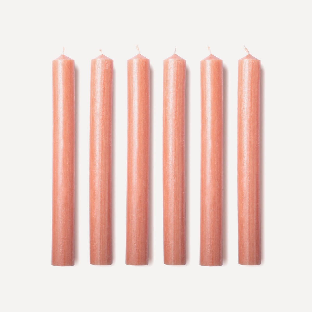 Issy Granger | Orange Wax Coloured Dinner Candles